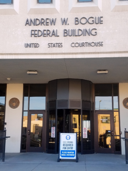 federal building with sign
